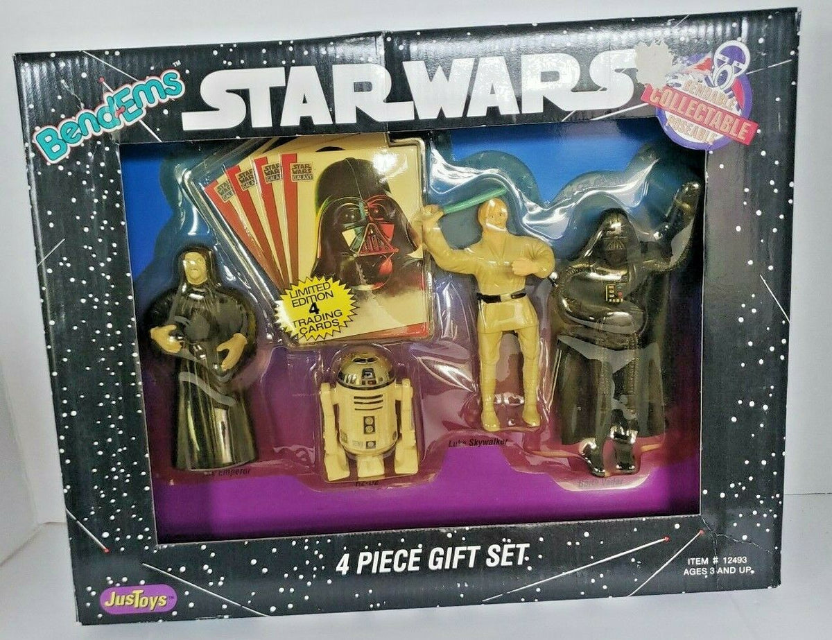 At Auction: 1993 STAR WARS 4 PIECE GIFT SET.WITH 4 RARE CARDS