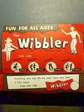 Vintage 1950's Red Wibbler Toy /St Louis/ New Old Stock