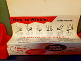 Vintage 1950's Red Wibbler Toy /St Louis/ New Old Stock