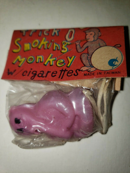 1960s Vintage Dime Store Toy Trick O Smoking Monkey w/ cigarette Pink