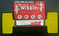 Vintage 1950's Yellow Wibbler Toy /St Louis/ New Old Stock