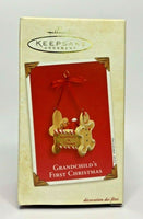 2003 Hallmark Grandchild's First Christmas Ornament U21