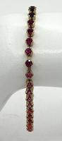 Vintage Avon Gold Tone Red Pink Purple Gradient Rhinestone Bracelet SKU PB78